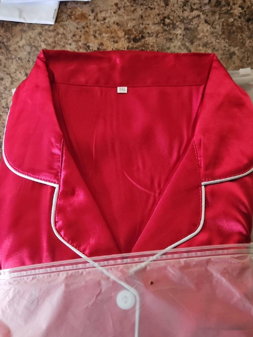 Red Satin Women's Pajama Top with White Piping with matching Shorts.